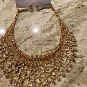 Fashion Jewelry. Gold Necklace with Crystal Accents